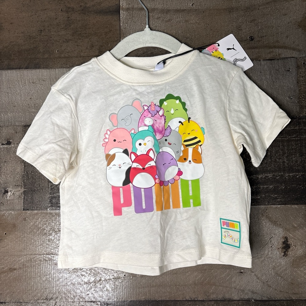 Puma Kids Cream Tee with Colorful Character Stack Graphic